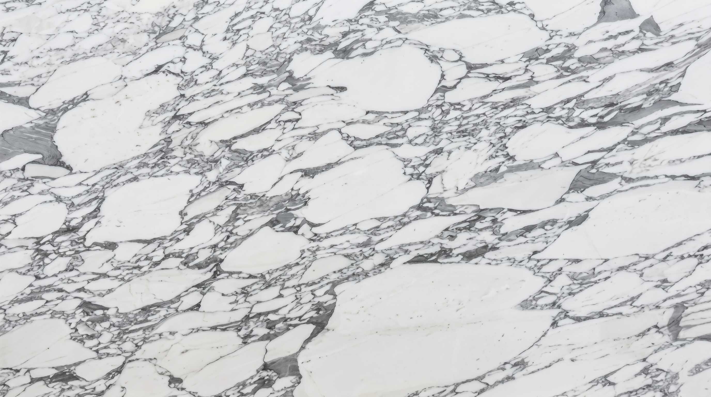 Premium Arabescato White Imported Marble featuring sweeping dusty-grey veins across a pristine luminous white canvas. High-quality polished slab supplied wholesale in Kishangarh.