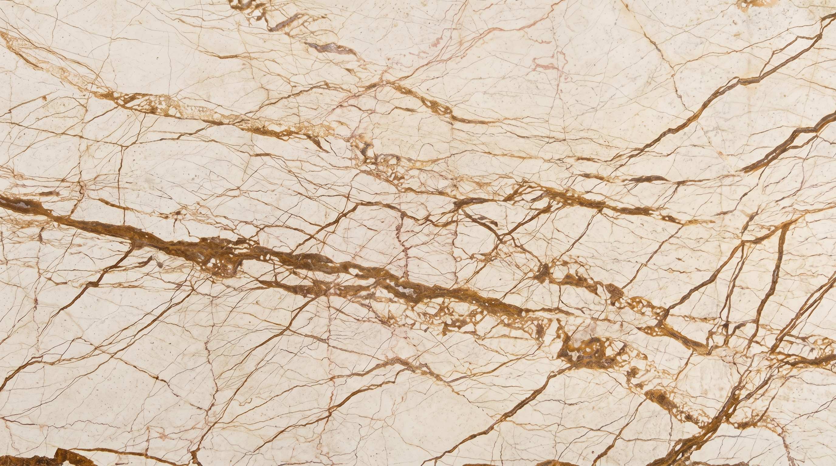 Premium Sofita Beige Imported Marble featuring a golden-beige background heavily layered with rich darker brown veins. High-quality polished slab supplied wholesale in Kishangarh.