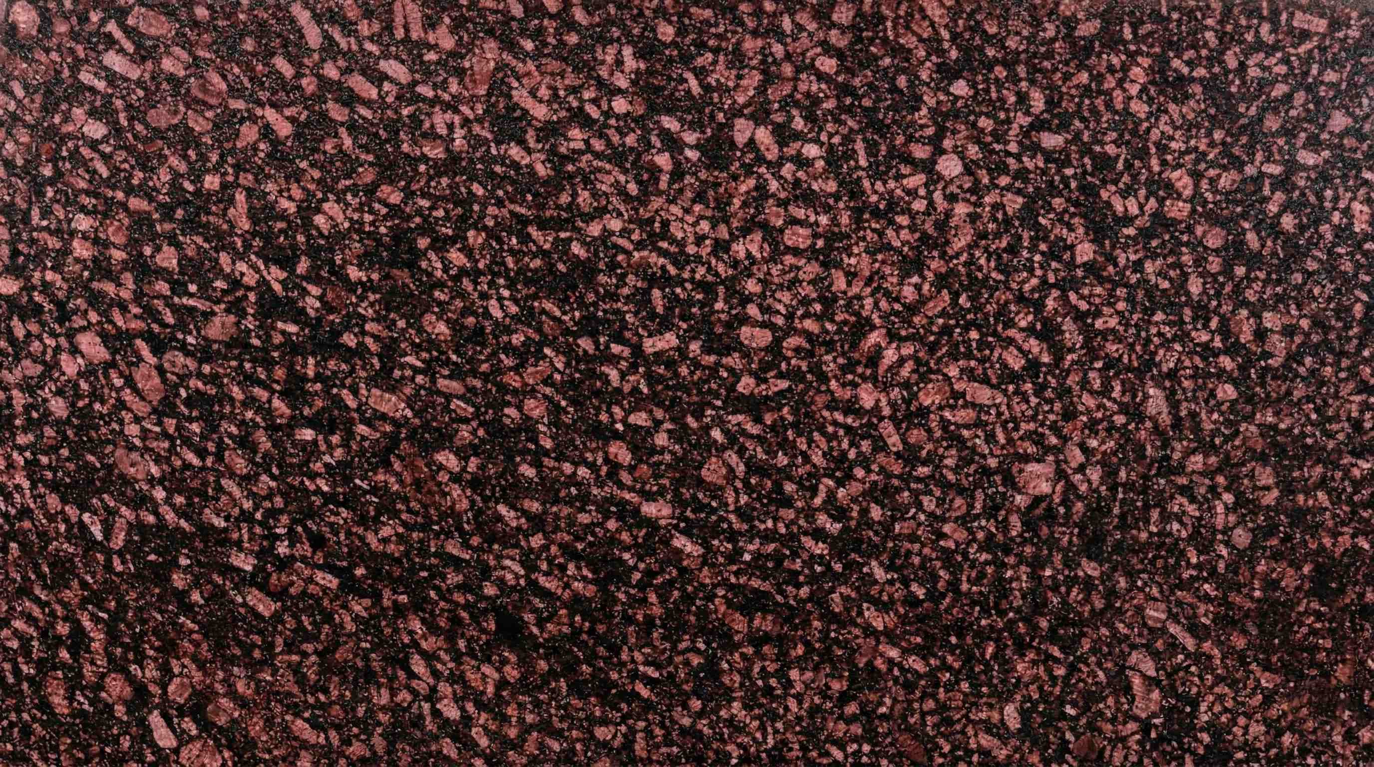 Premium Crystal Brown Indian Granite featuring rich, deep chocolate tones infused with crystalline highlights. High-quality polished slab supplied wholesale in Kishangarh.