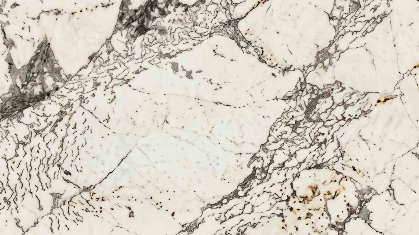 Premium Monalisa Indian Granite featuring swirling patterns of exotic multi-colors. High-quality polished slab supplied wholesale in Kishangarh.
