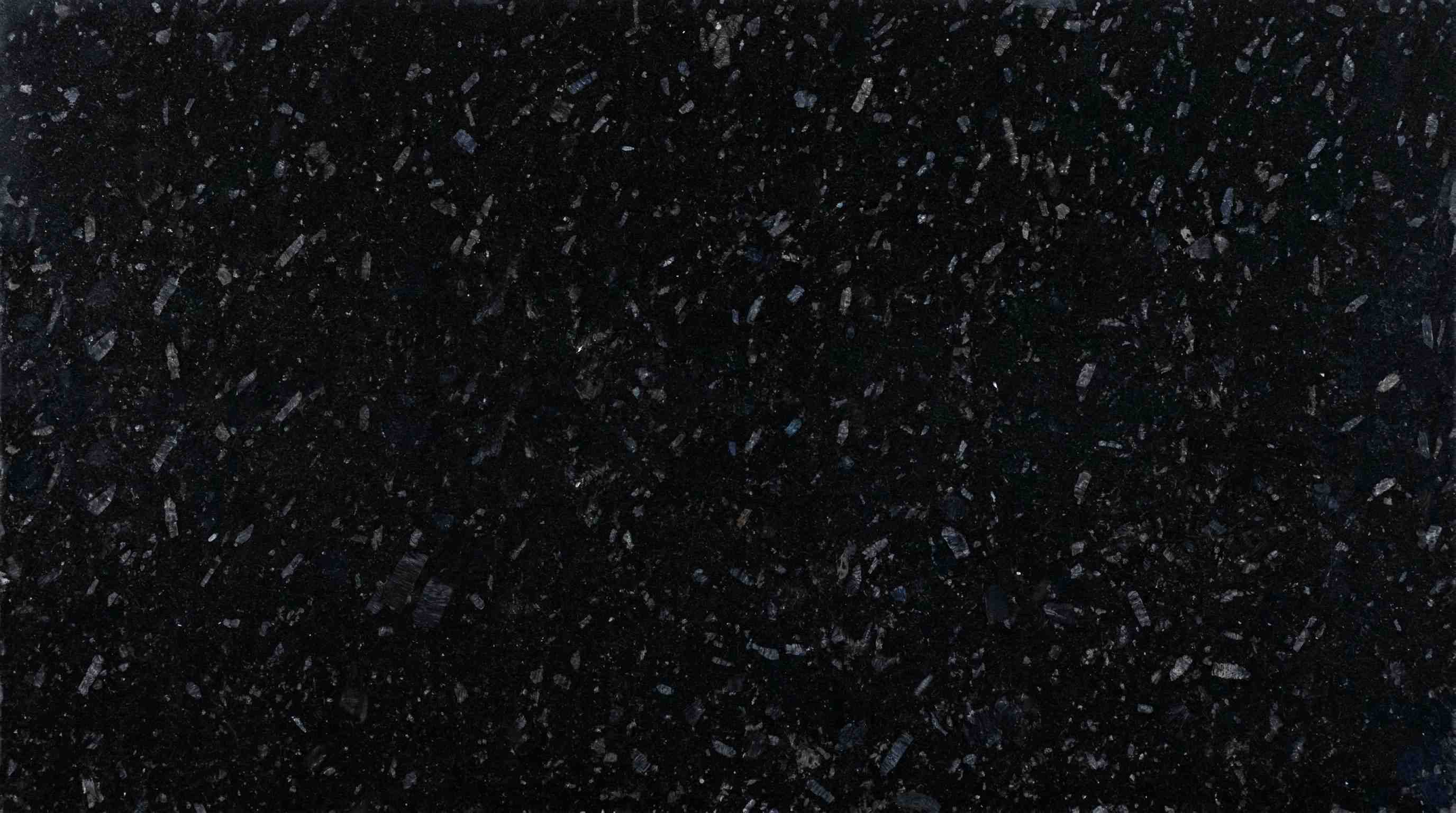 Premium Pearl Black Indian Granite featuring a deep black stone illuminated by subtle pearlescent flecks. High-quality polished slab supplied wholesale in Kishangarh.